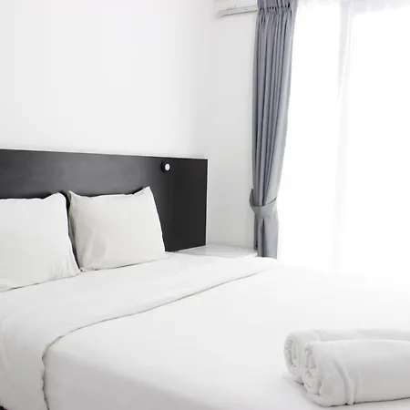 Stylish Studio Room Grand Asia Afrika Apartment By Travelio
